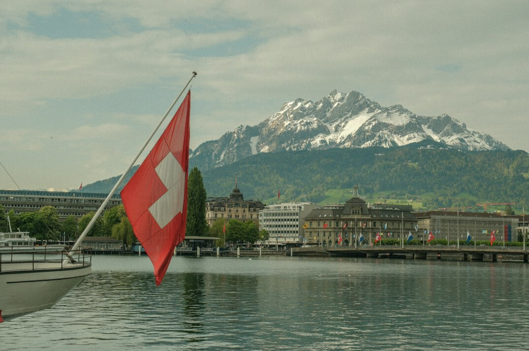 swiss landscape with flag
